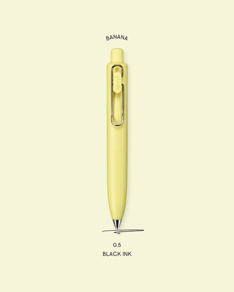 A picture of the Uniball One P Ballpoint Pen in the color Banana, with text that explains that the nib size is 0.5 and the ink color is black