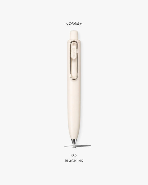 A picture of the Uniball One P Ballpoint Pen in the color Yogurt, with text that explains that the nib size is 0.5 and the ink color is black