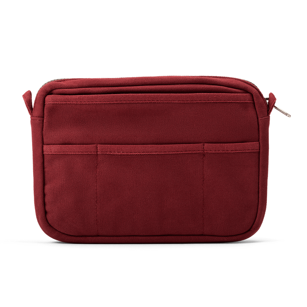 Soolla Studio Pouch in Sangria — close-up of wine red duck canvas and YKK zipper