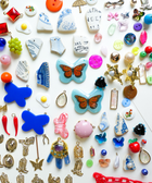 Vintage Journal Charms contents showing variety of glass beads, wood pieces, and vintage materials