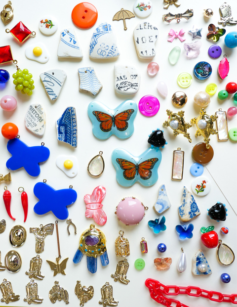 Vintage Journal Charms contents showing variety of glass beads, wood pieces, and vintage materials