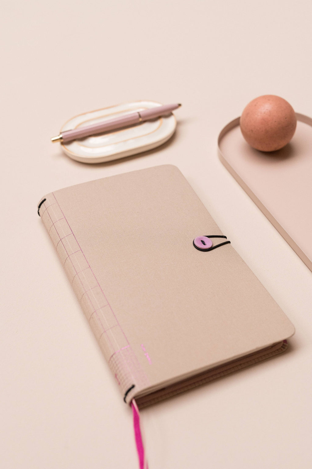 "Travelers Journal" med knapp