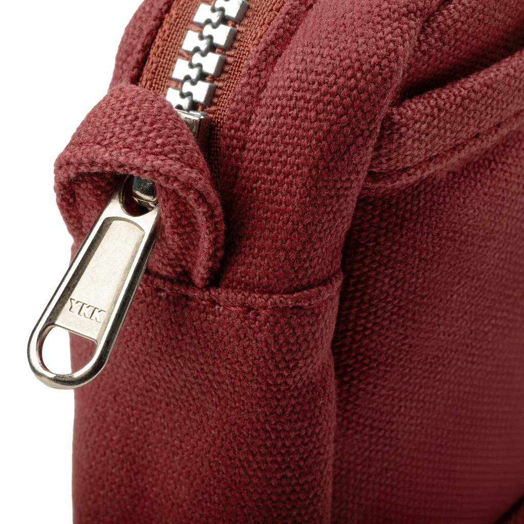 Soolla Studio Pouch in Sangria — wine red stationery pouch styled with supplies