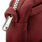 Soolla Studio Pouch in Sangria — wine red stationery pouch styled with supplies