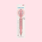 Pink Kuru Toga pencil with packaging on a light pink background