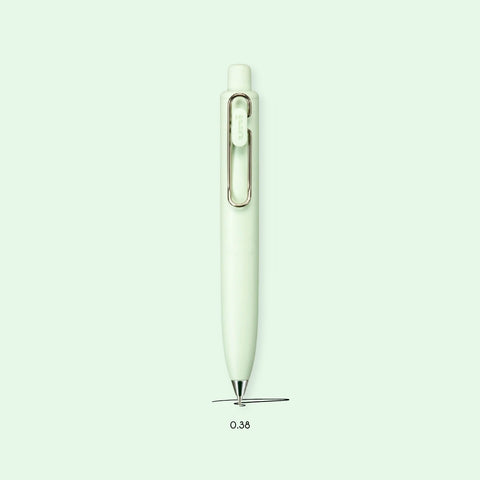 Mint green pen on a light green background