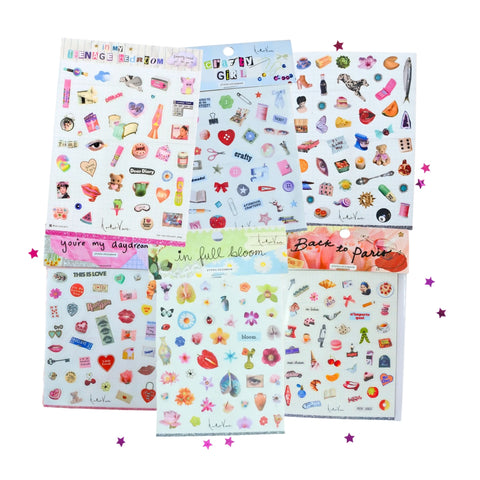 Haricot Vert Sticker Bundle featuring all 6 signature sticker sheet designs including Daydream, Girlhood, Paris, Bloom, Crafty Girl, and Main Character