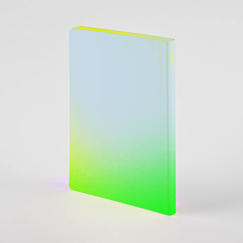 Side view of neon green A5+ bullet journal  by Nuuna showing colored edges and 1.6cm thickness