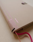 "Travelers Journal" med knapp