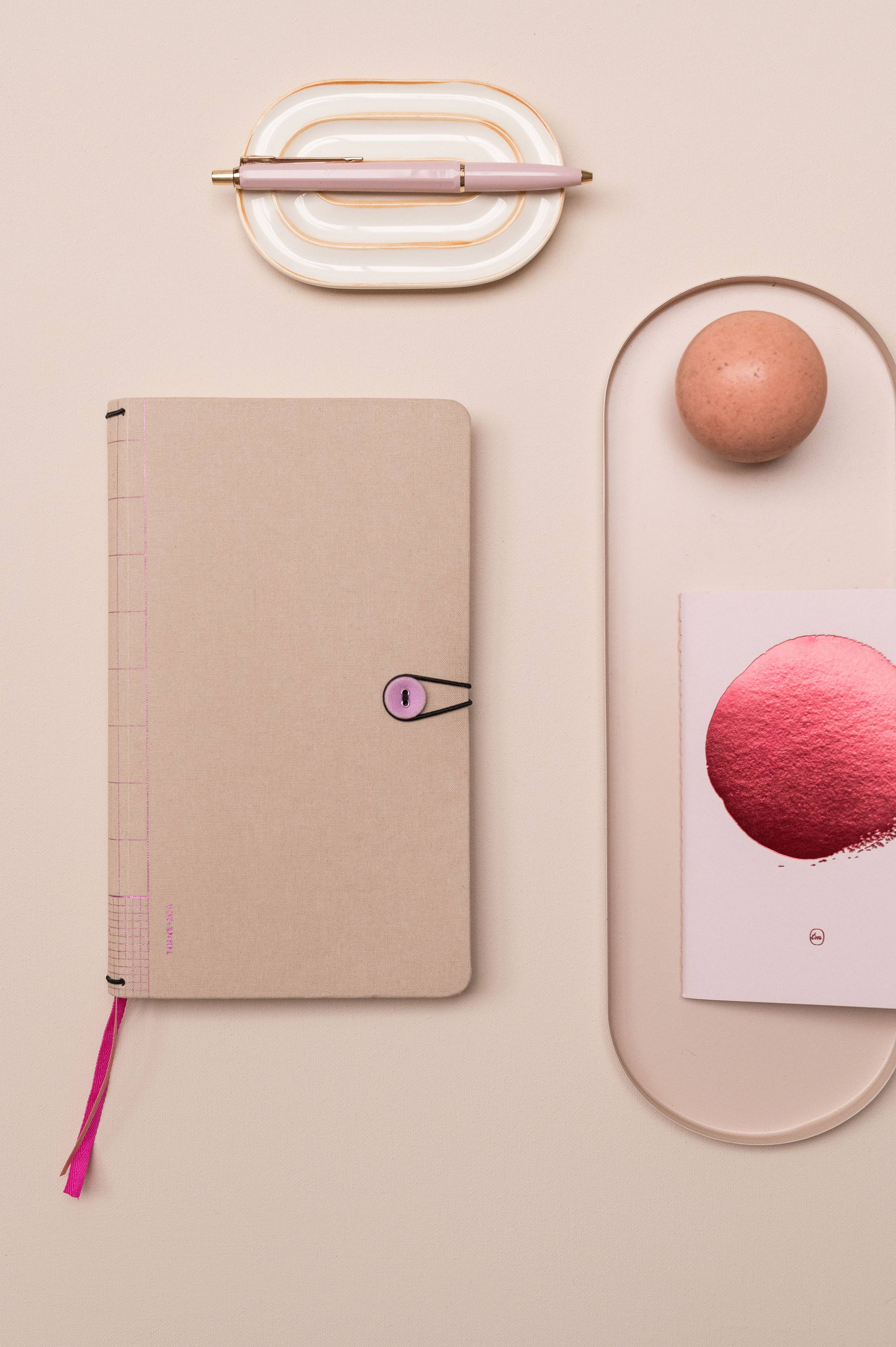 "Travelers Journal" med knapp