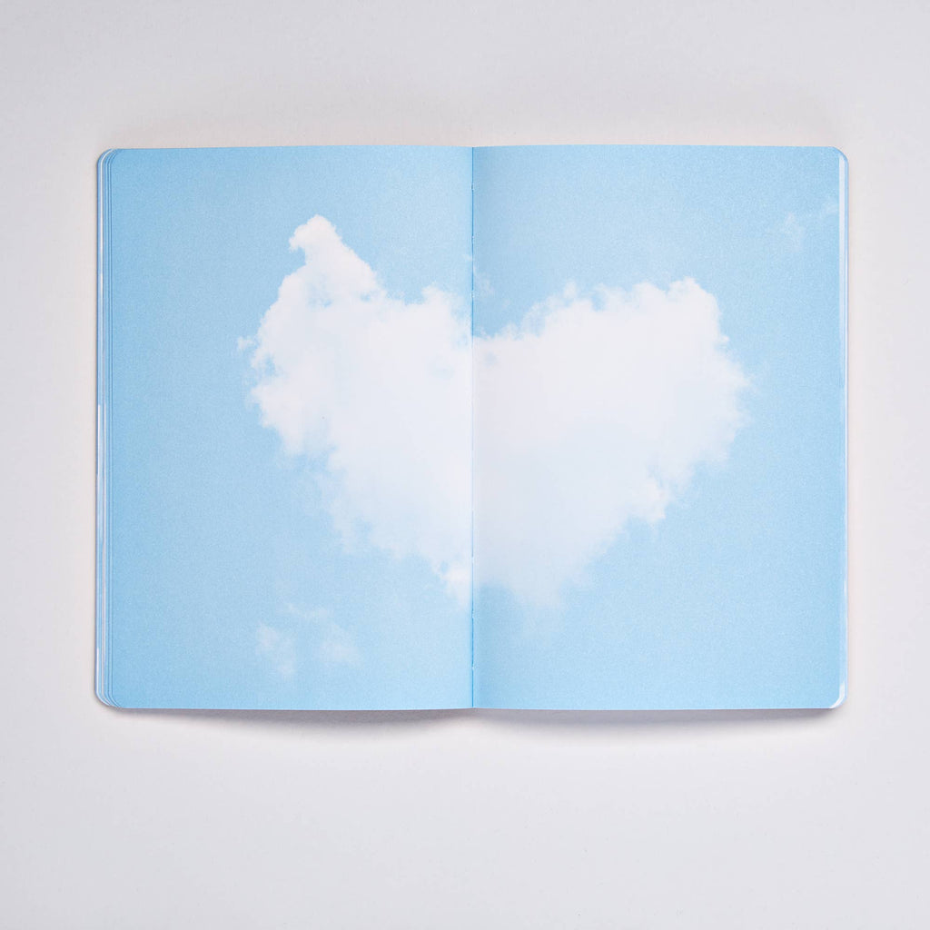 Open Clouds Junk Journal spread with a heart-shaped white cloud in a blue sky