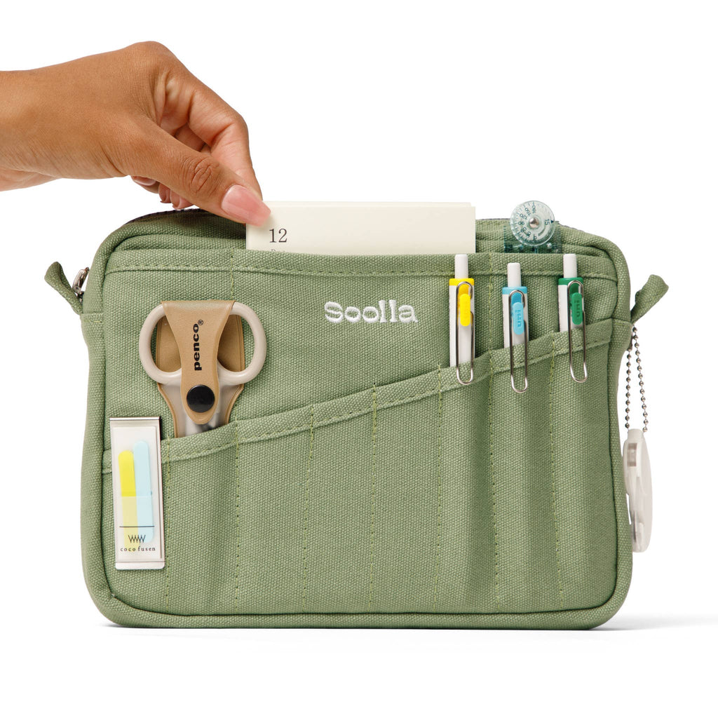 Soolla Studio Pouch in Ganja Green — green duck canvas texture and zipper detail