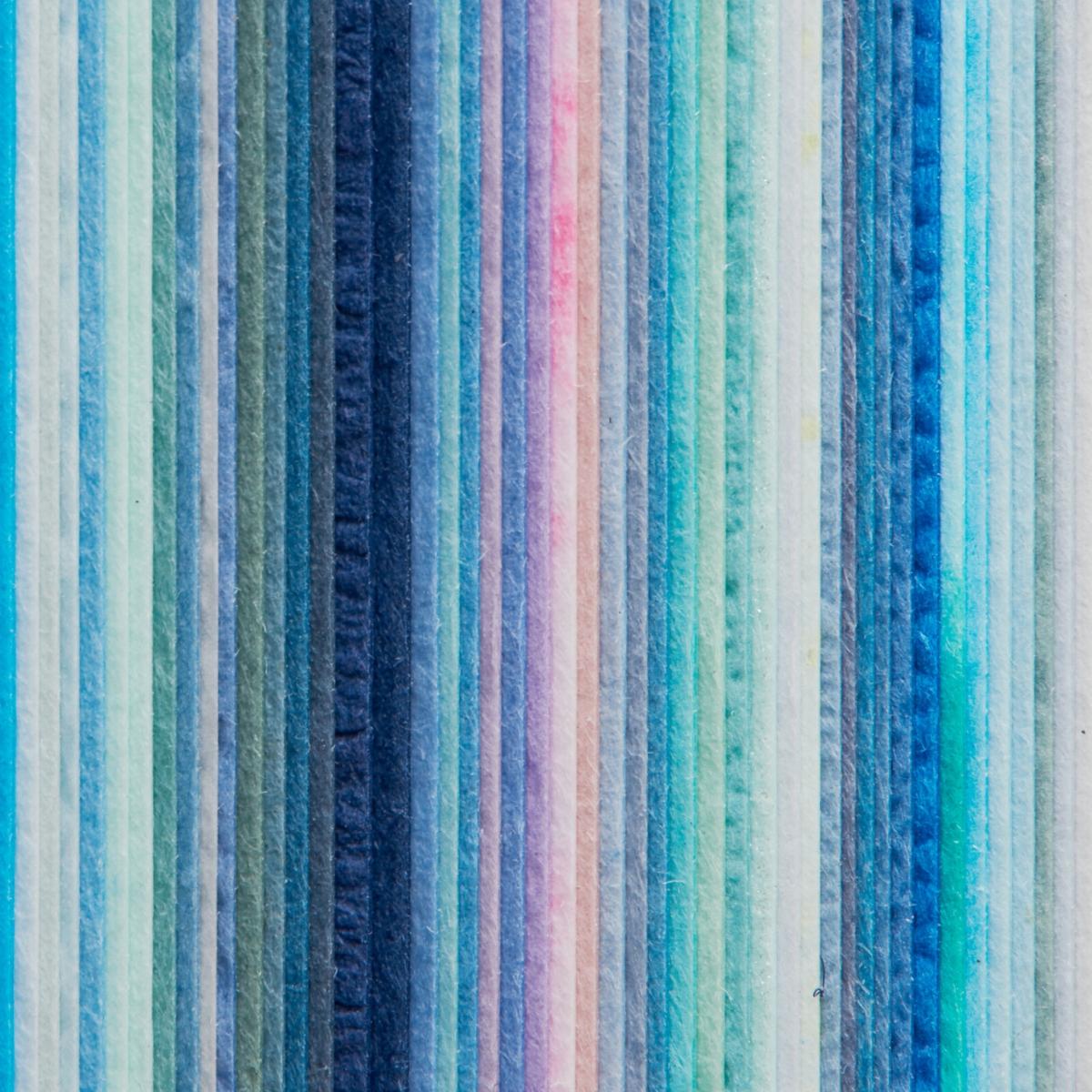 Åpen SIKI Tsuyu skissebok med assorterte blå teksturerte washi-ark